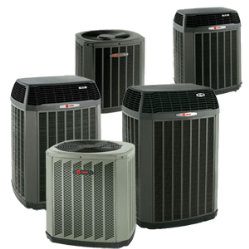 A group of air conditioners that are all different sizes.